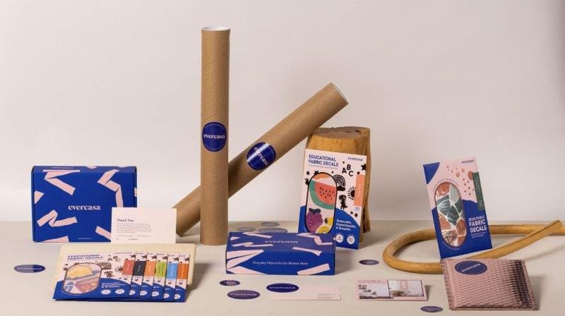 Brand identity can be established through various design elements like color, texture, and space on packaging and communication materials, as seen in our work for evercasa.